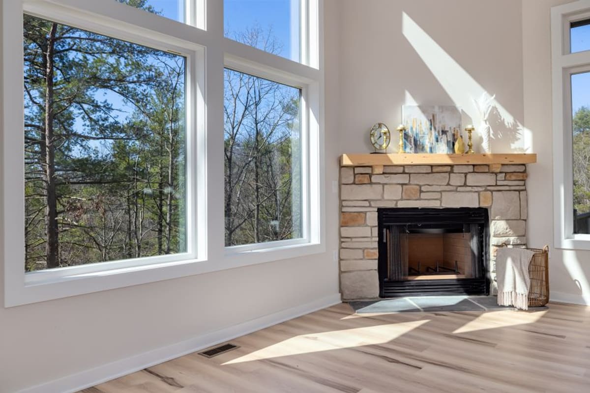 New energy-saving windows filling a bright living room with daylight